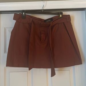 Rust colored skirt with built in tie belt